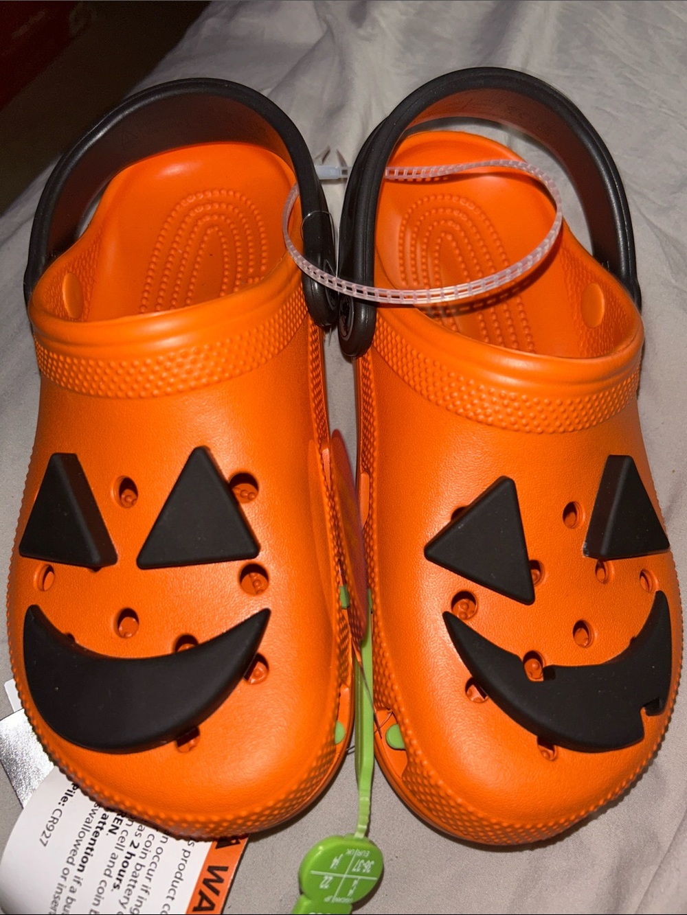 CROCS Kids Orange Pumpkin Clogs with Black Face Accents